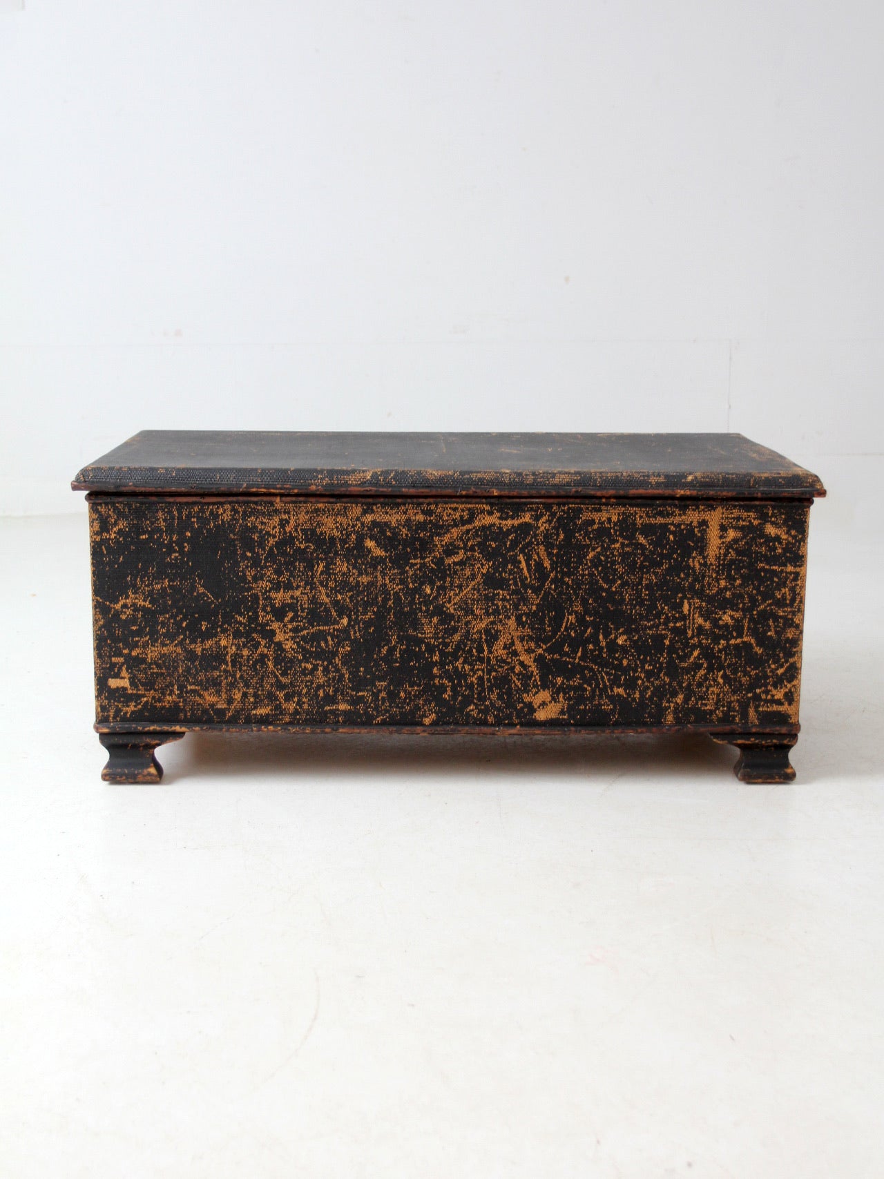 antique black woven canvas trunk
