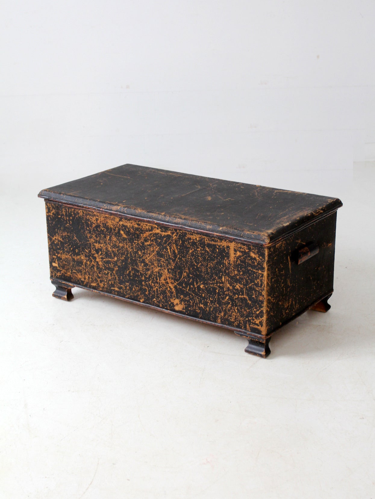 antique black woven canvas trunk