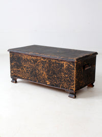 antique black woven canvas trunk