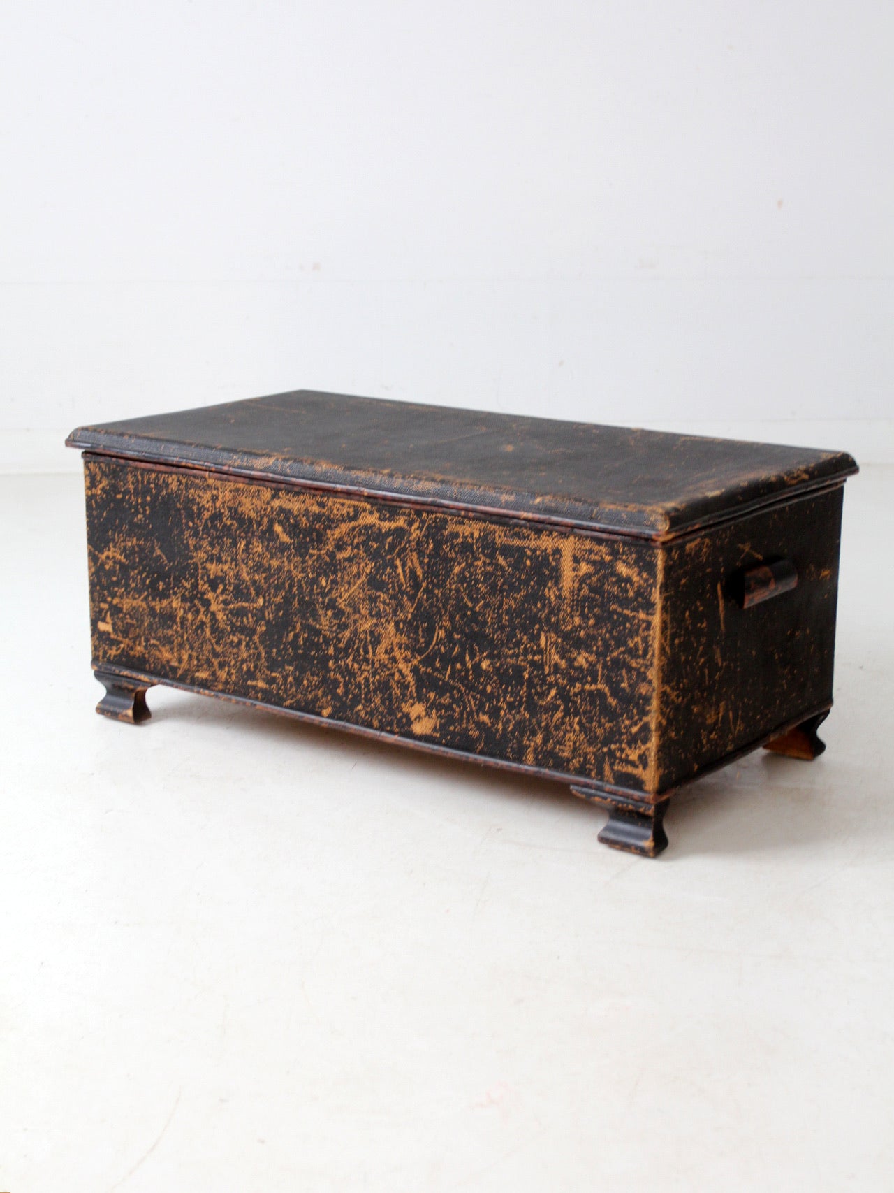 antique black woven canvas trunk