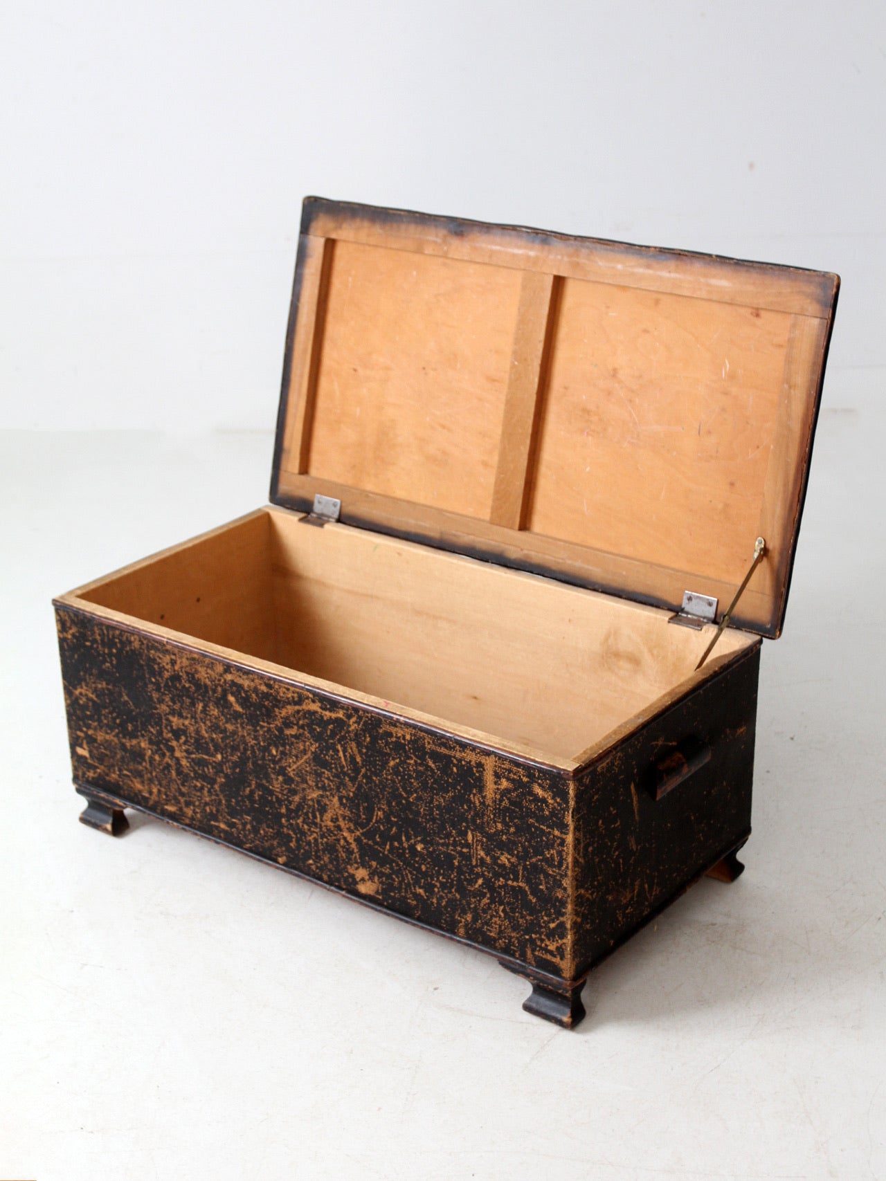 antique black woven canvas trunk