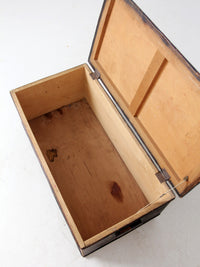 antique black woven canvas trunk