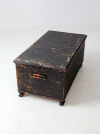 antique black woven canvas trunk