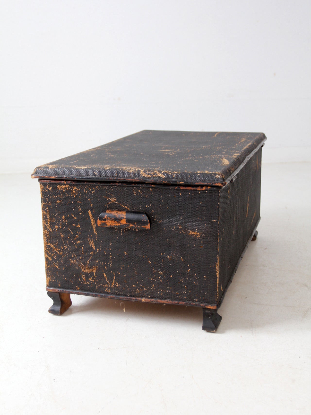 antique black woven canvas trunk