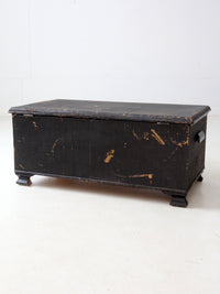 antique black woven canvas trunk