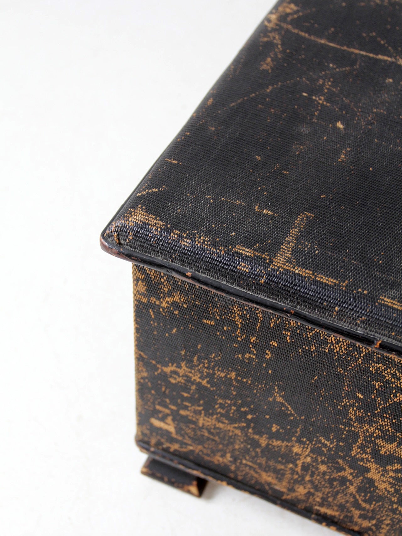 antique black woven canvas trunk