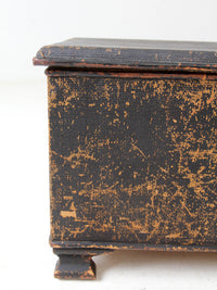 antique black woven canvas trunk