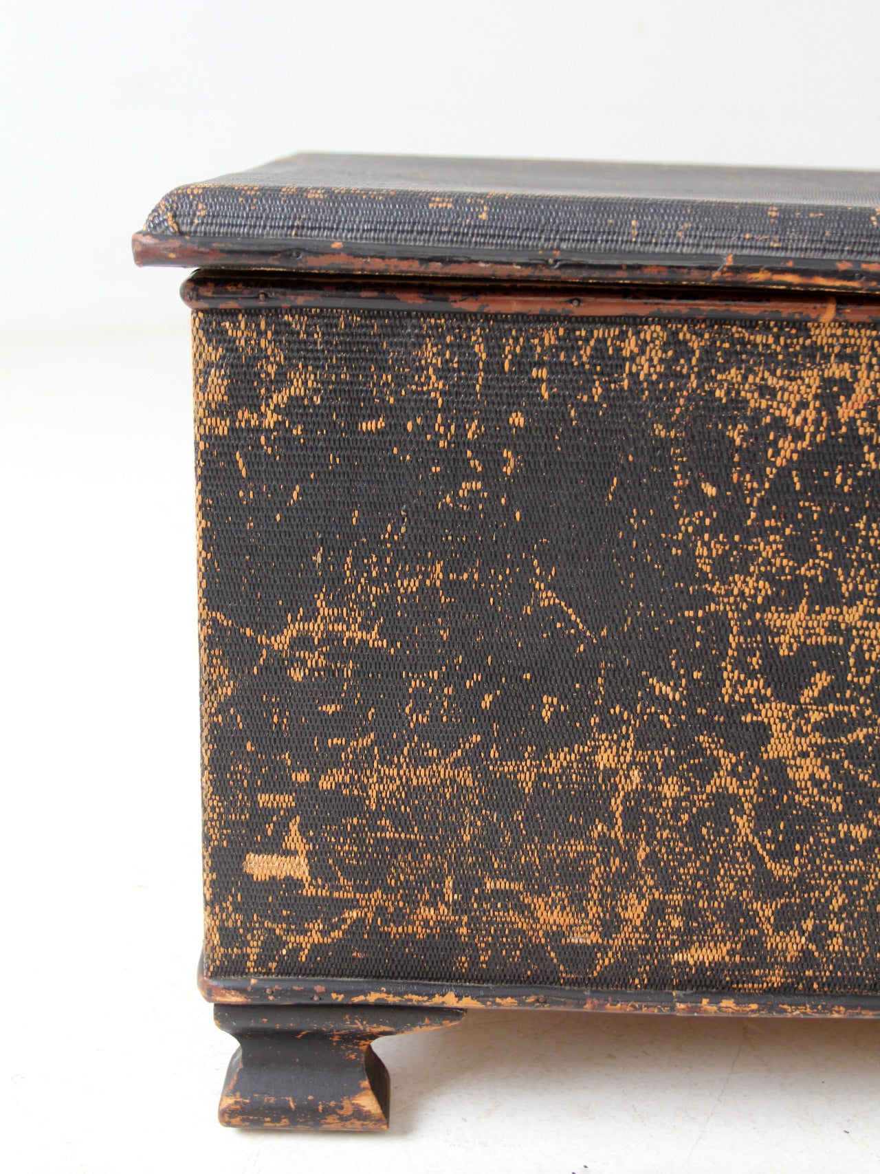 antique black woven canvas trunk