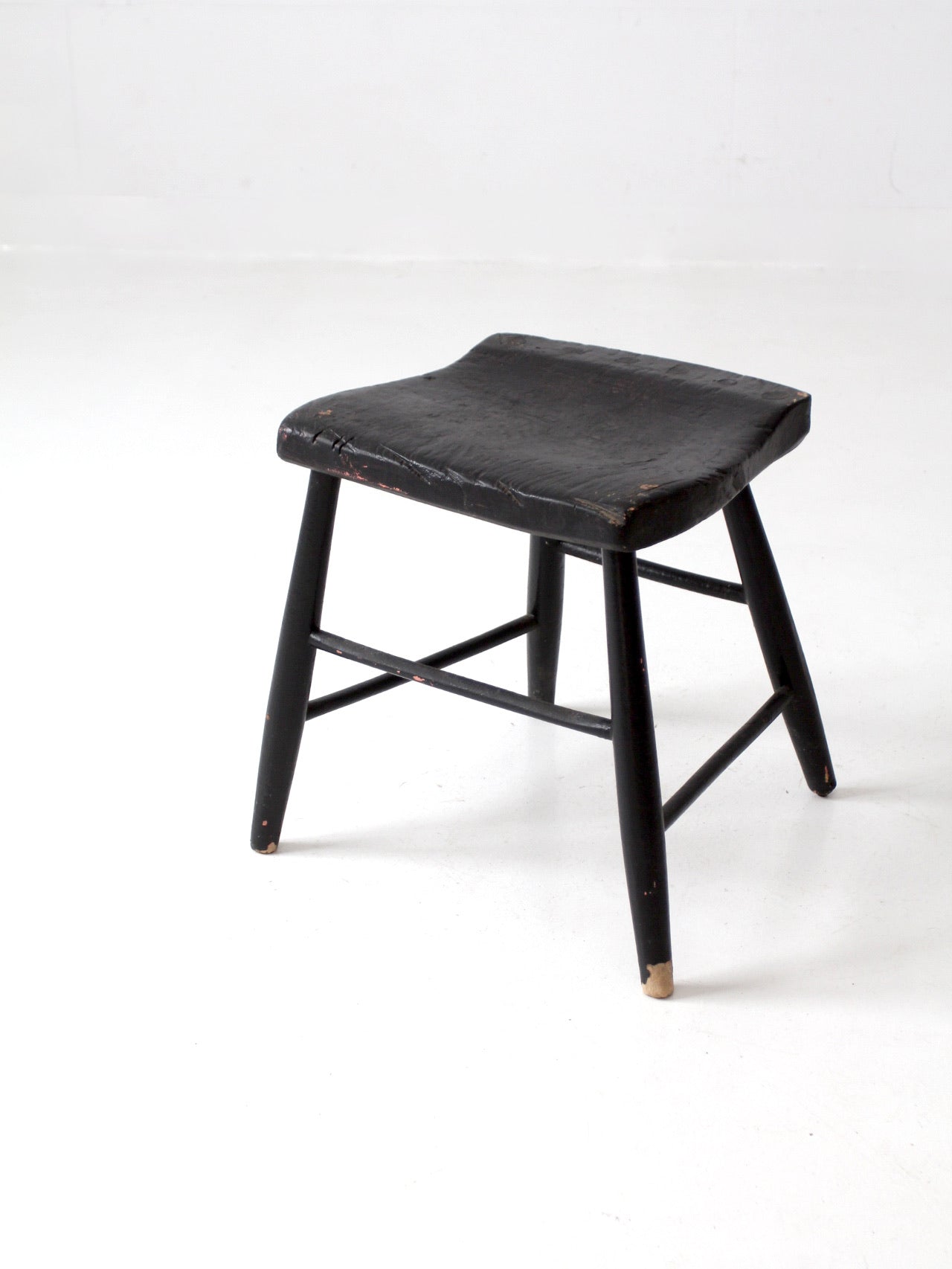 antique black wooden stool