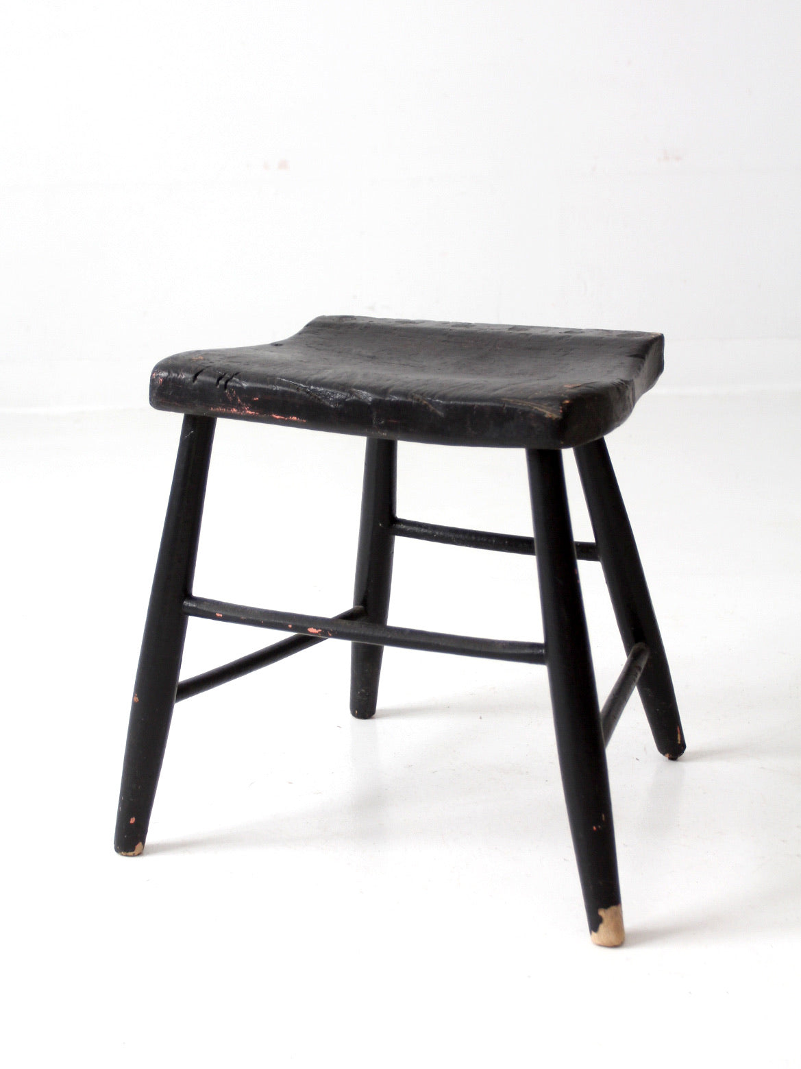 antique black wooden stool