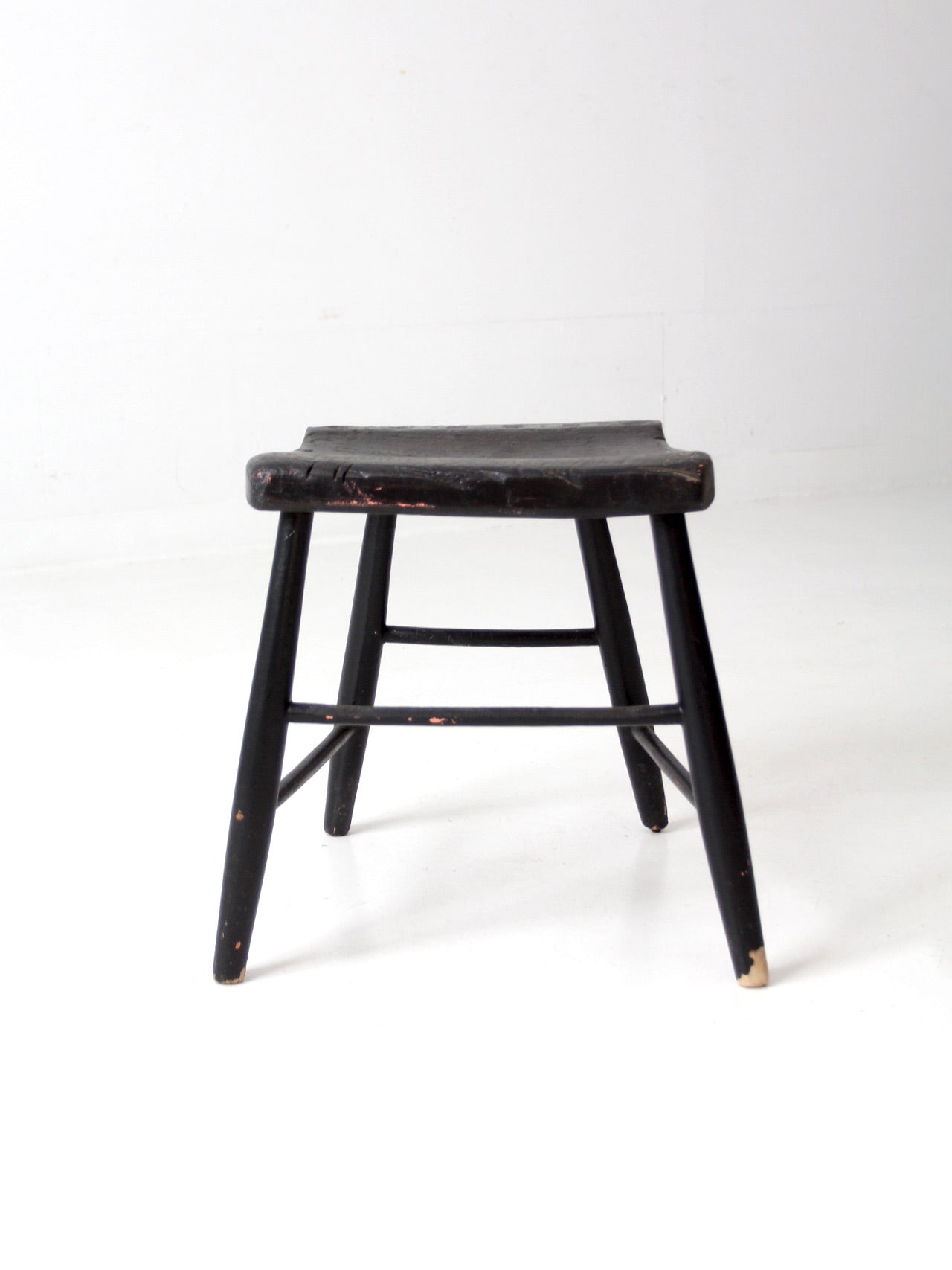 antique black wooden stool