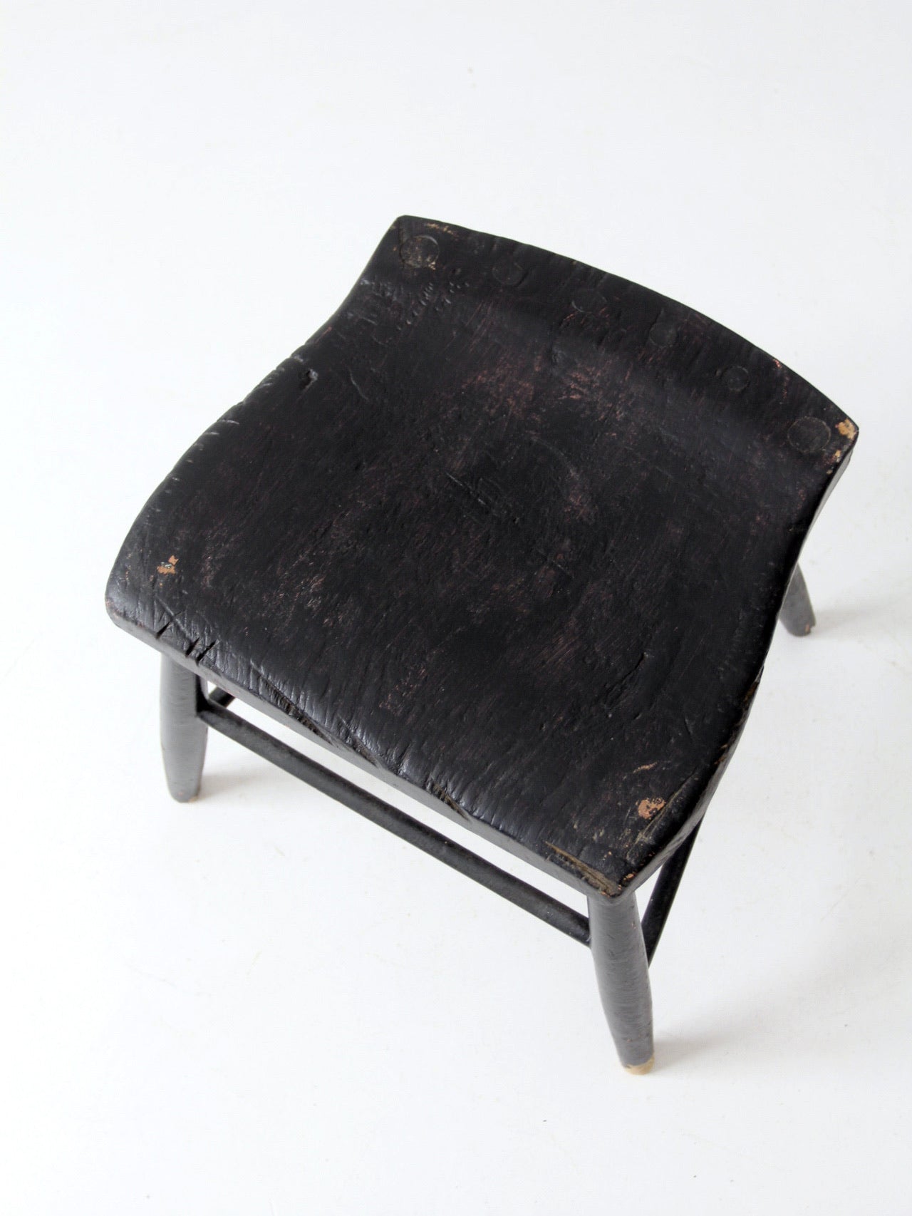 antique black wooden stool