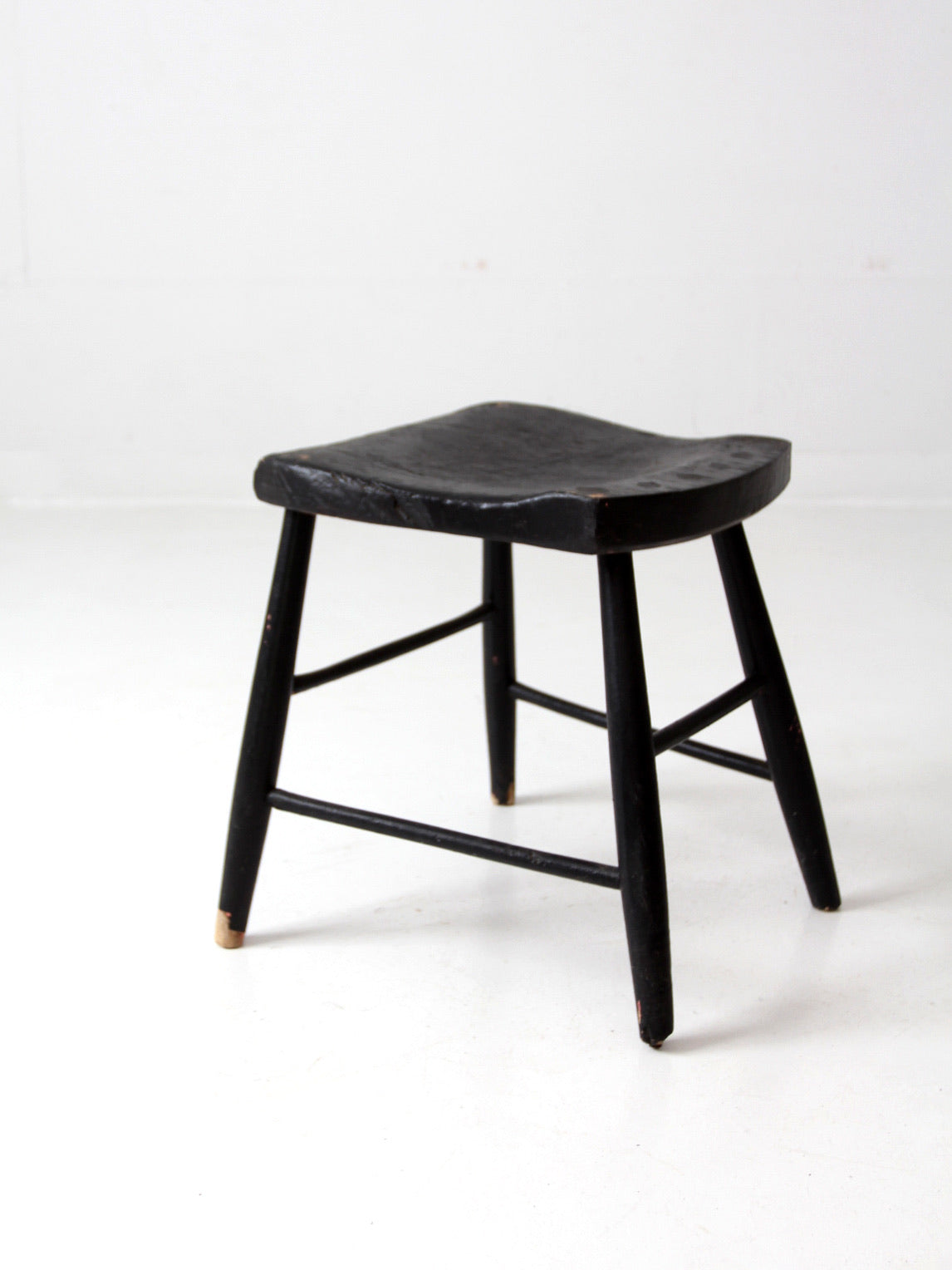 antique black wooden stool