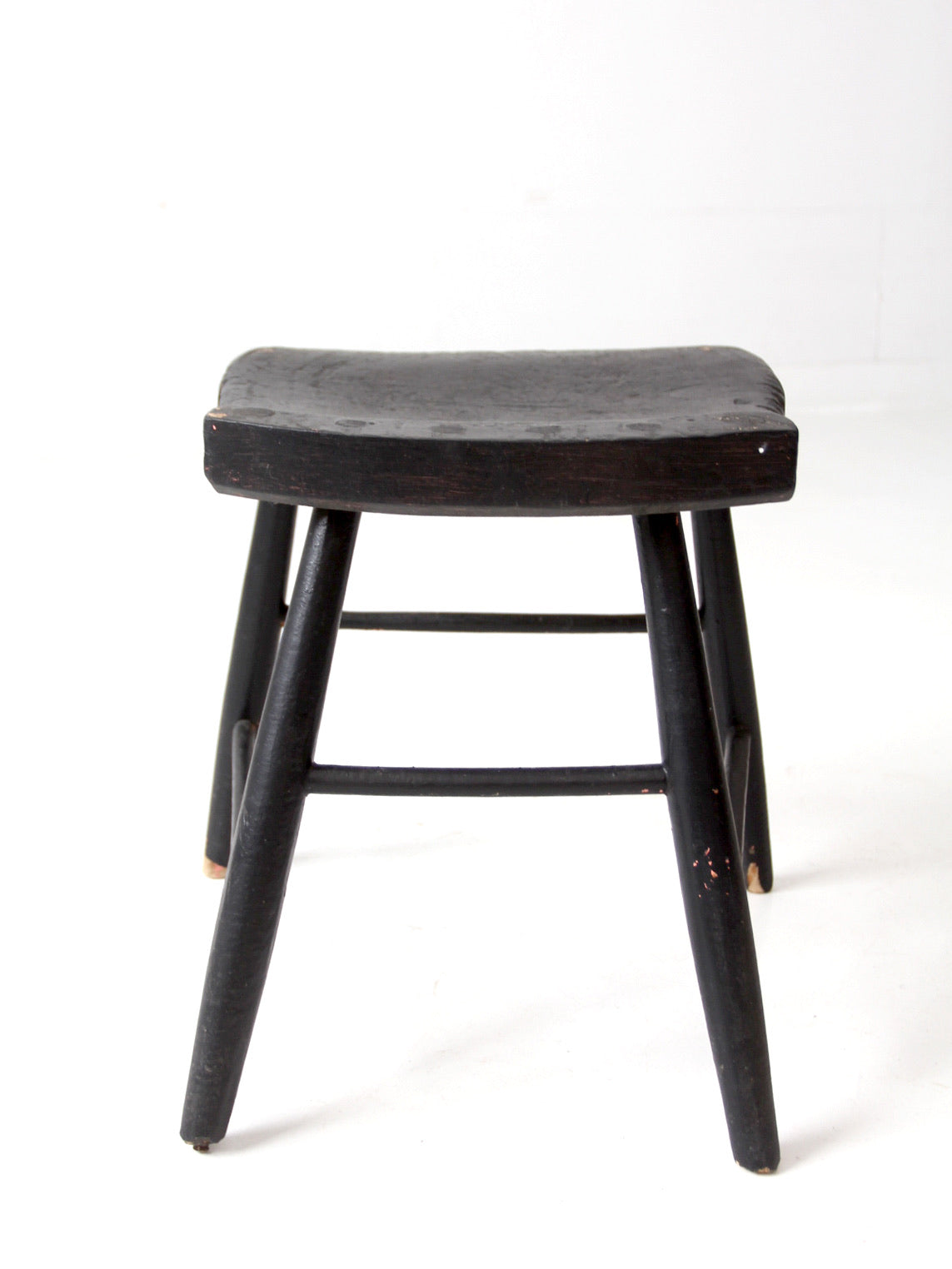 antique black wooden stool
