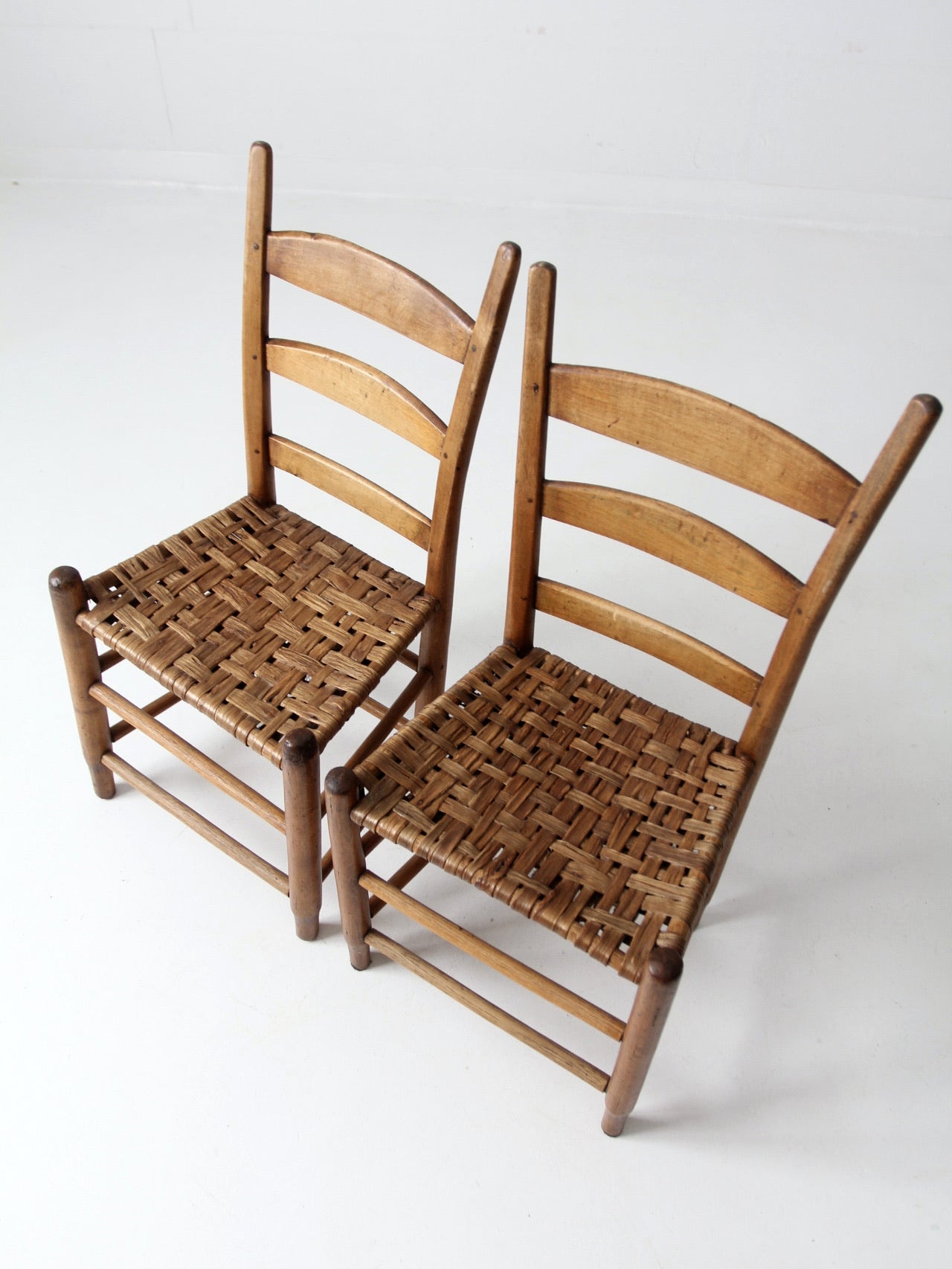 antique splint weave seat chairs pair