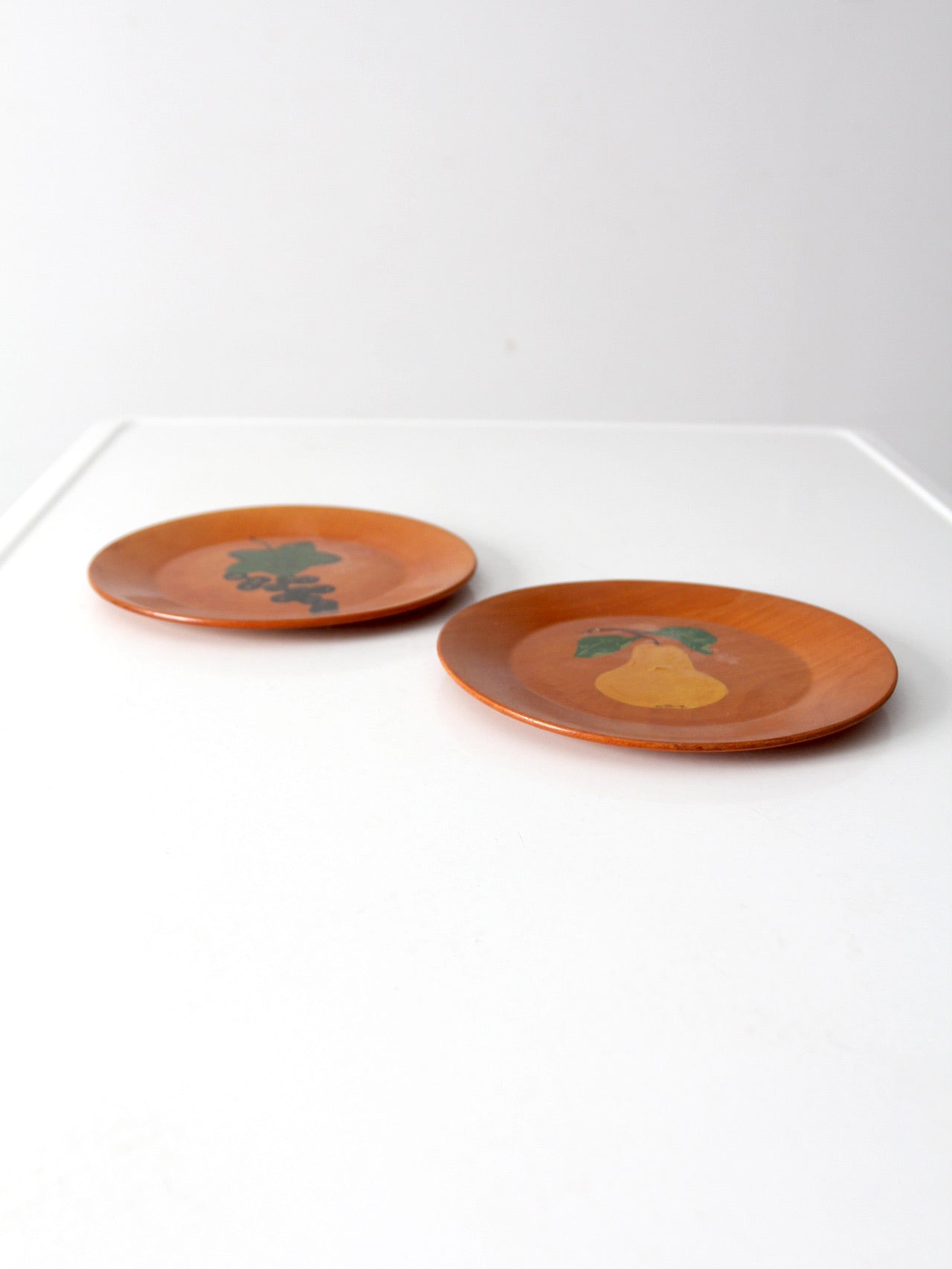 vintage hand-painted wood plates pair