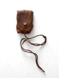 vintage Tower brand gauge with leather pouch