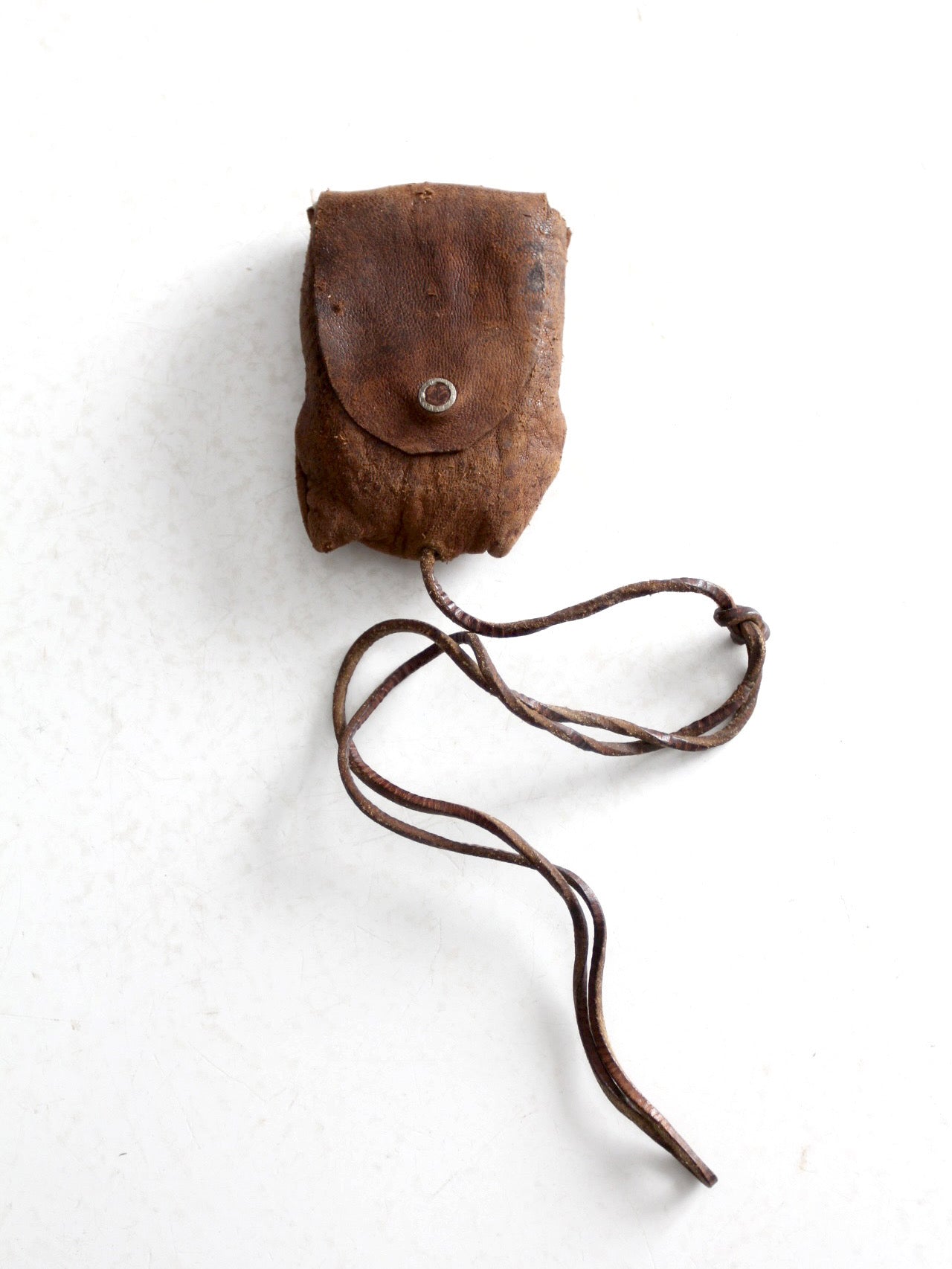 vintage Tower brand gauge with leather pouch