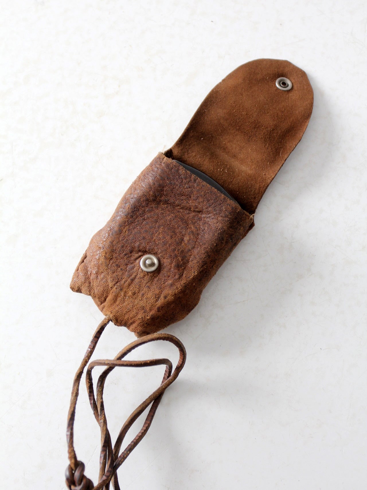 vintage Tower brand gauge with leather pouch