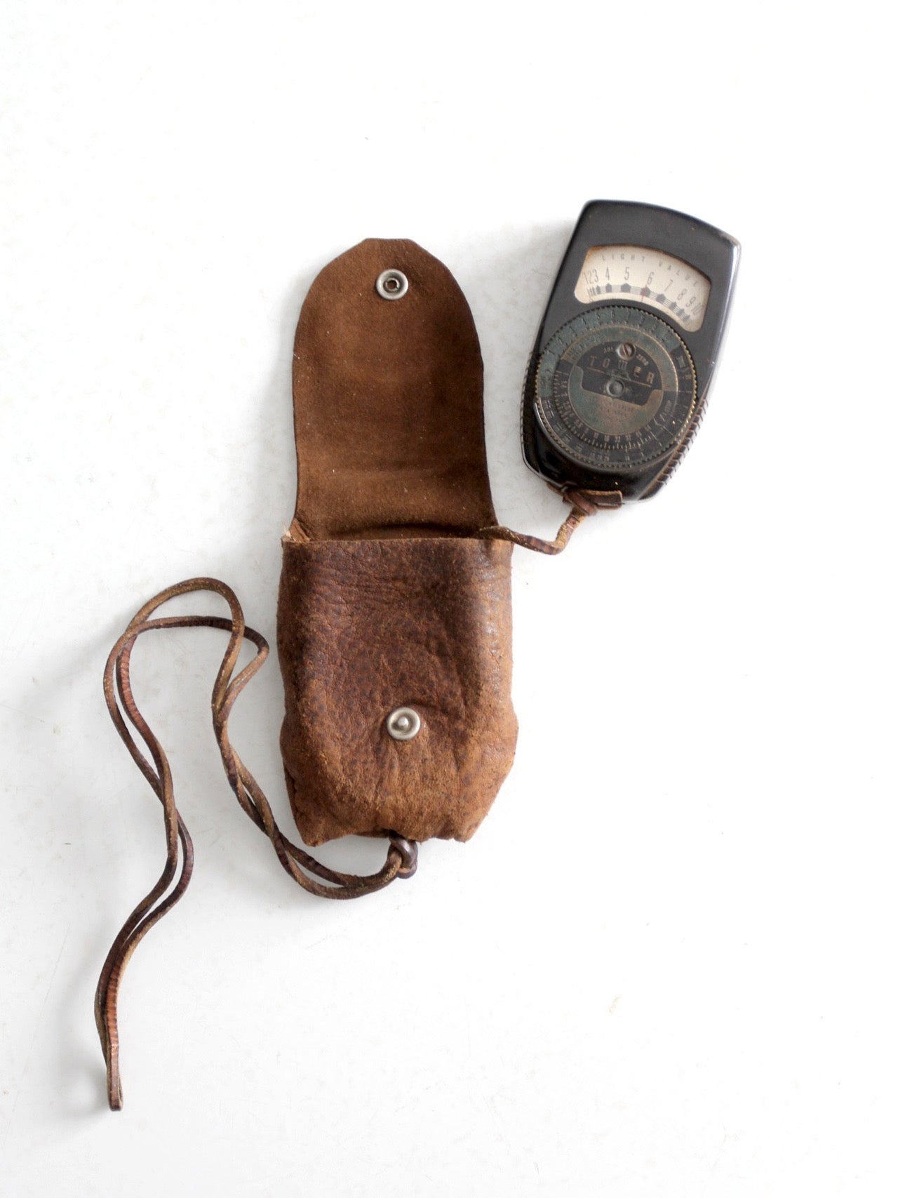 vintage Tower brand gauge with leather pouch