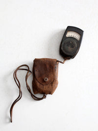 vintage Tower brand gauge with leather pouch