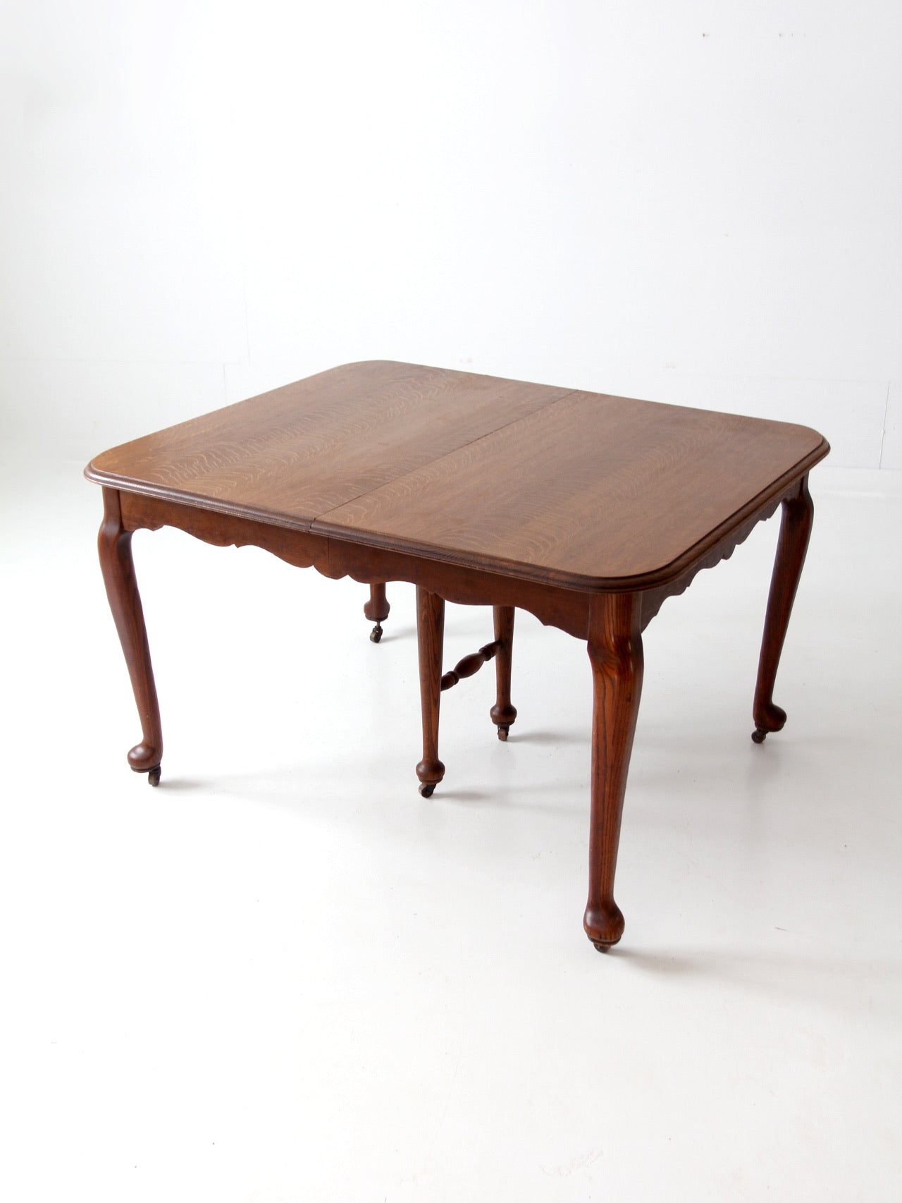 antique Queen Anne style dining table