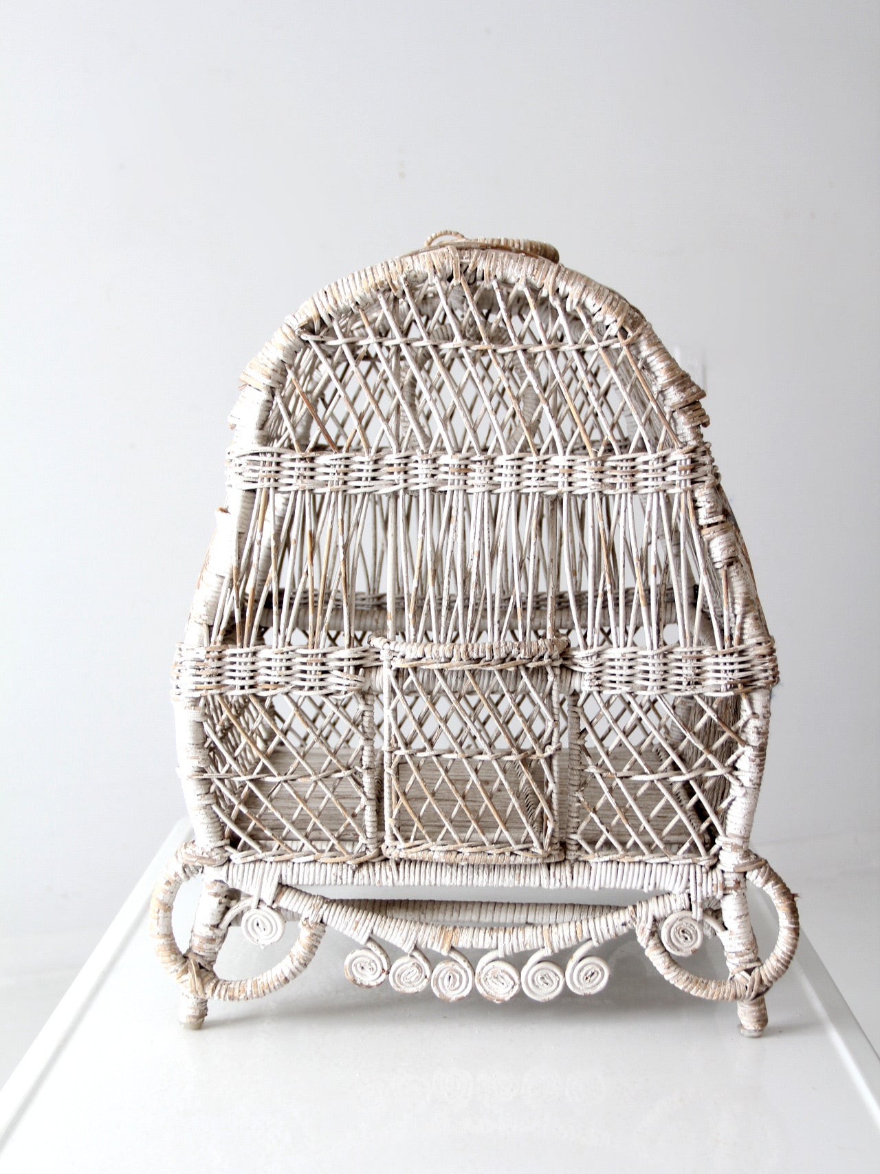vintage white wicker bird cage