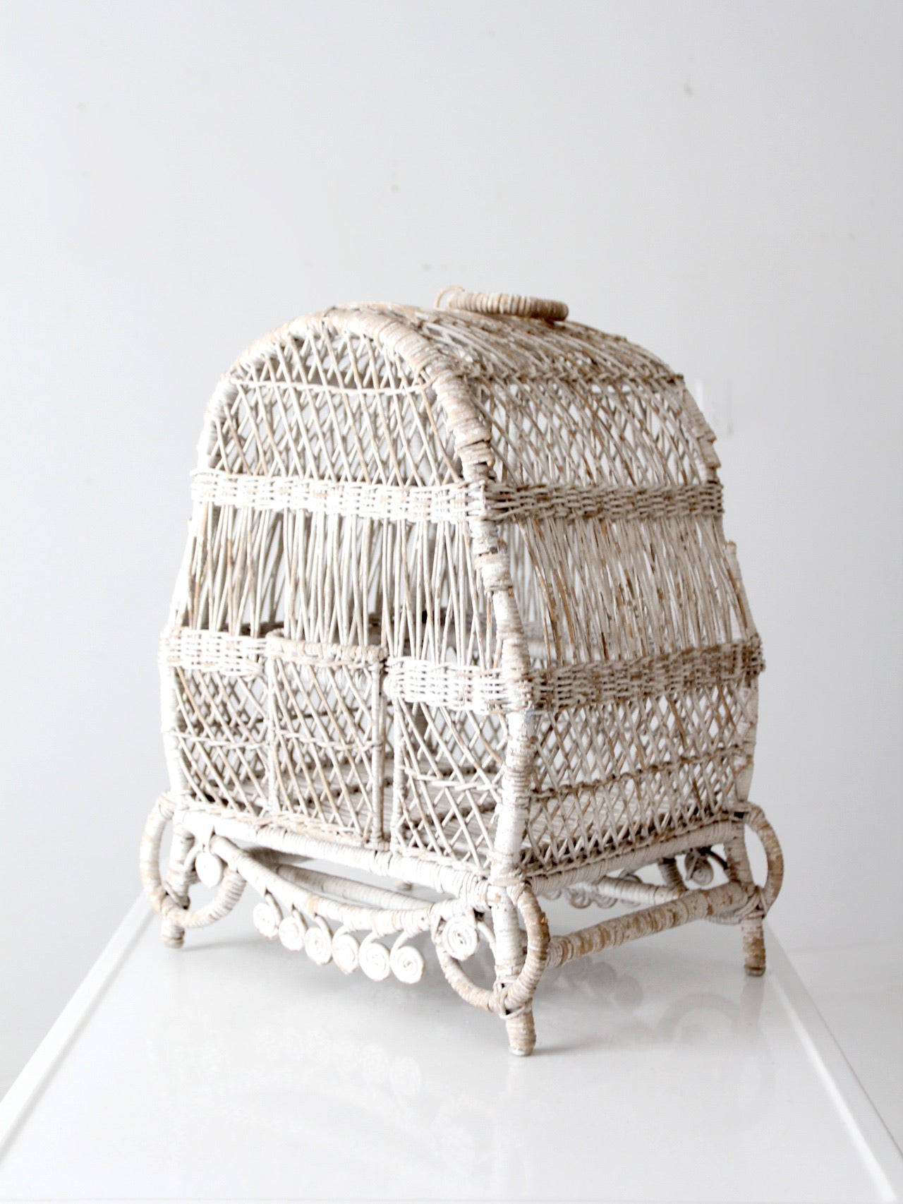 vintage white wicker bird cage