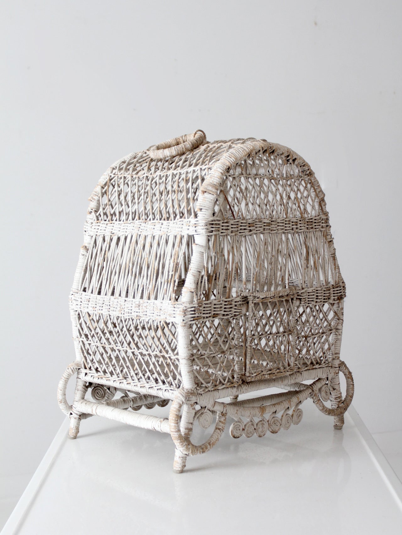 vintage white wicker bird cage