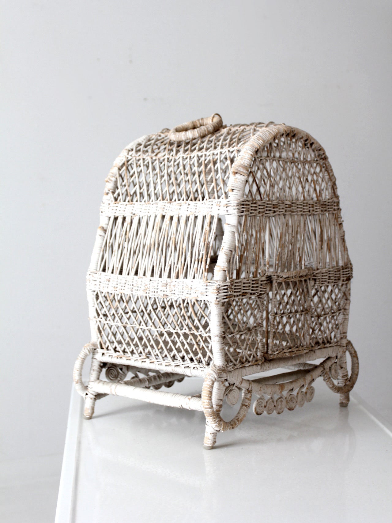 vintage white wicker bird cage
