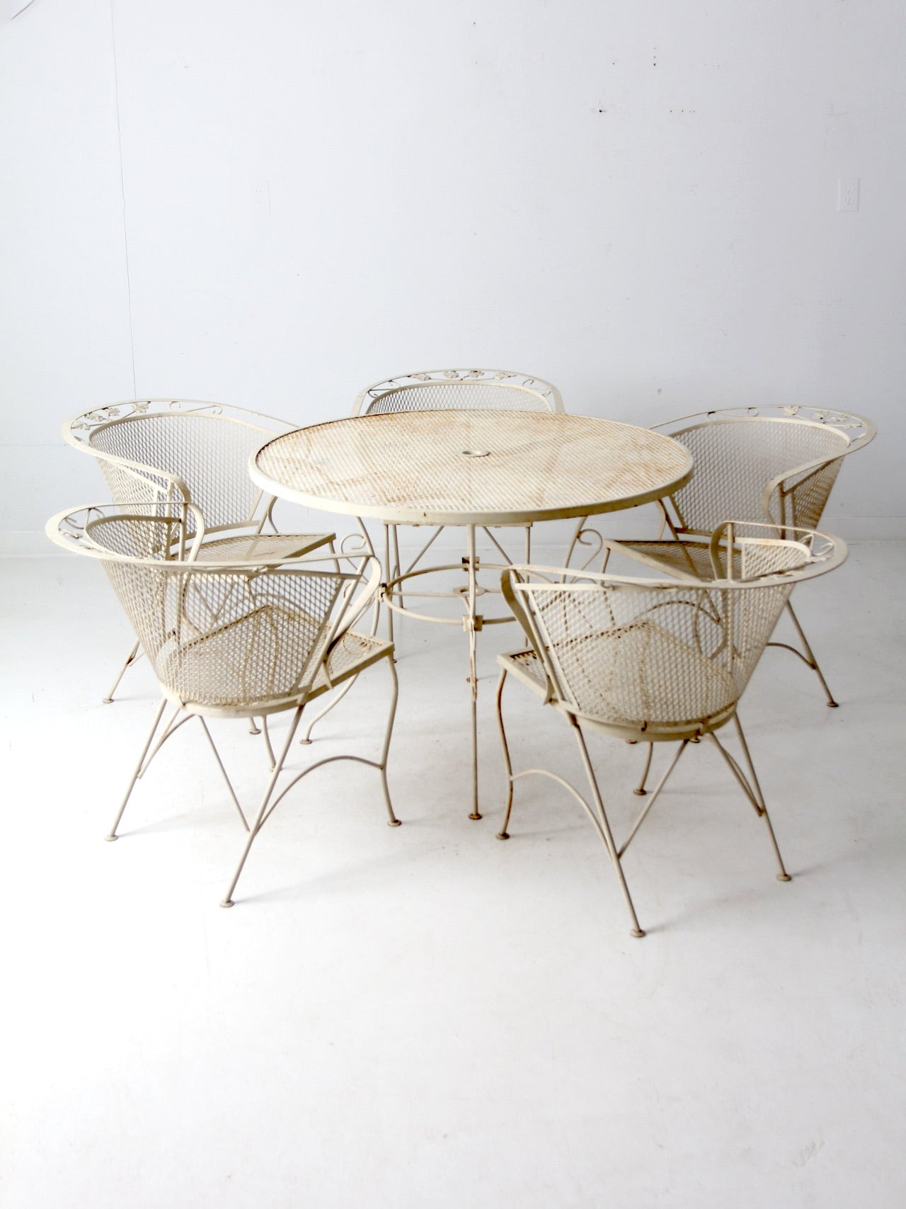 mid-century wrought iron & mesh patio set