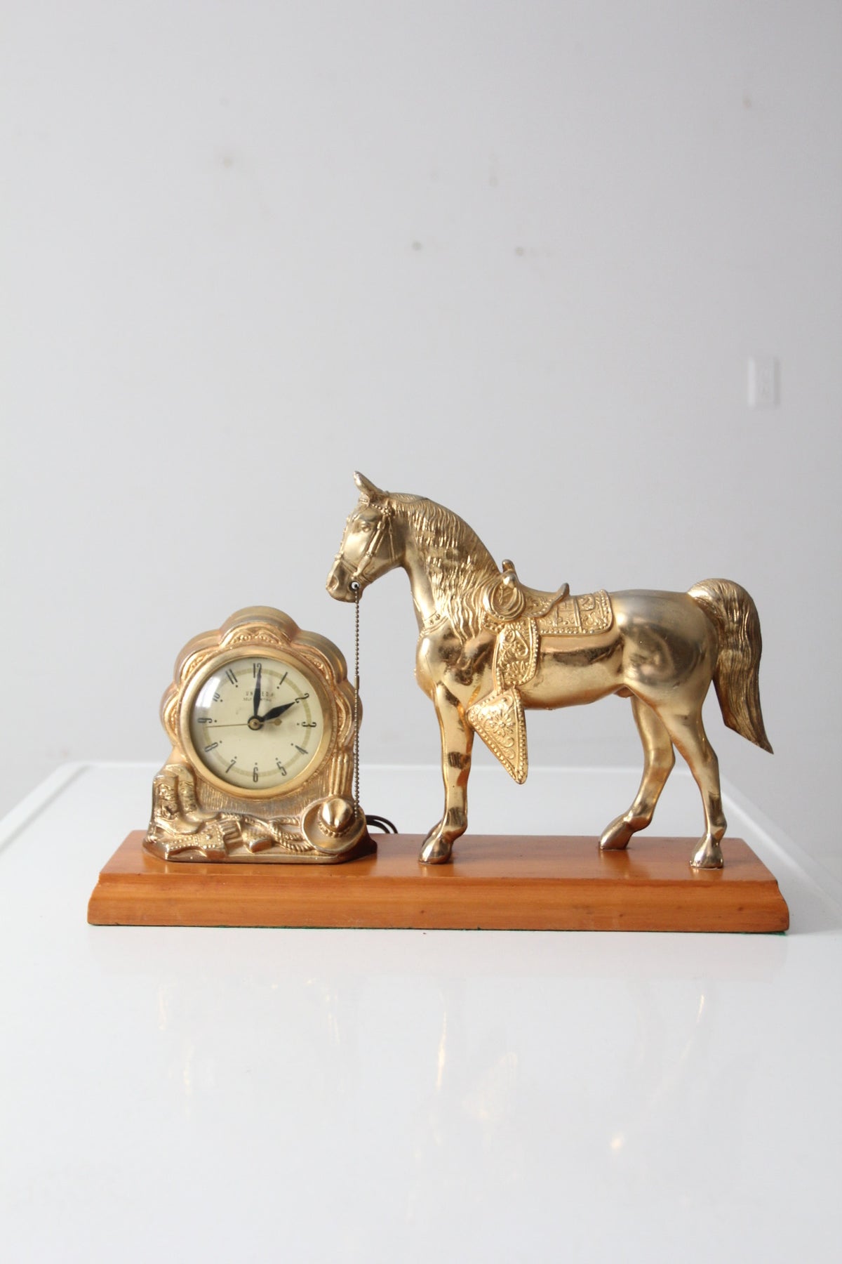 mid century United self-starting horse clock