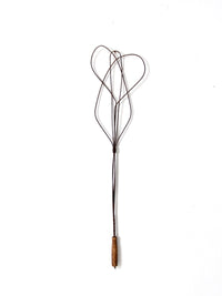 antique rug beater