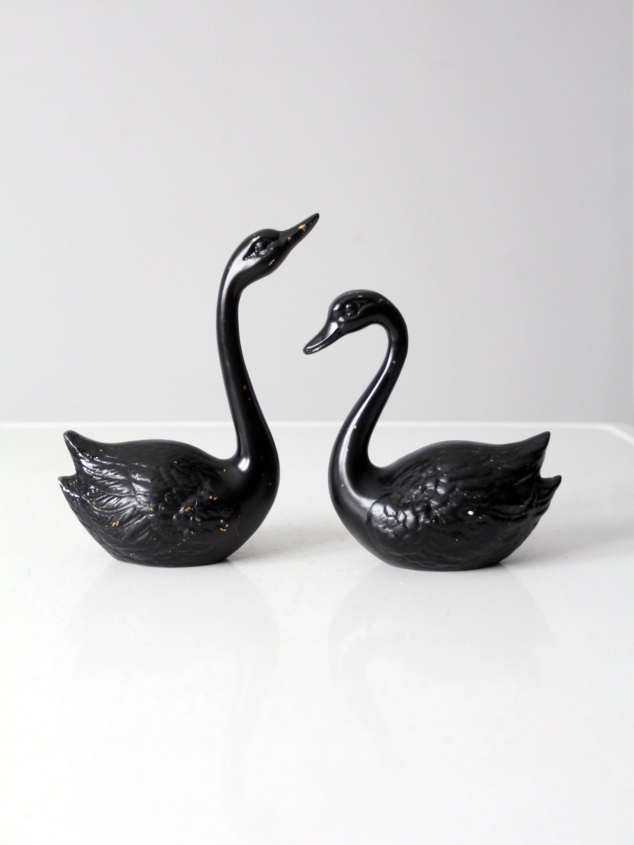 mid century painted black brass swans pair
