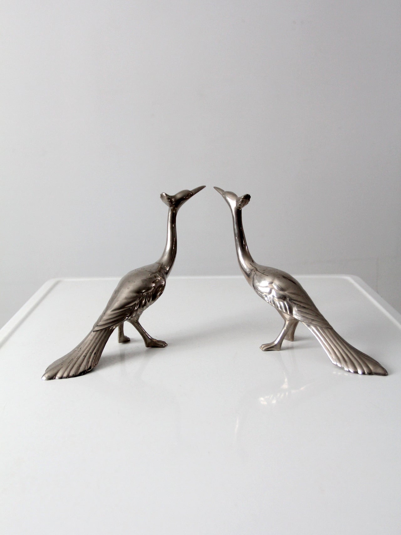 mid-century peacock figurines pair