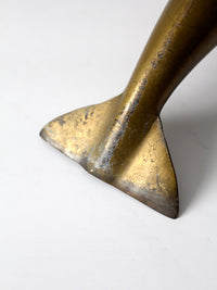 mid-century brass dolphin