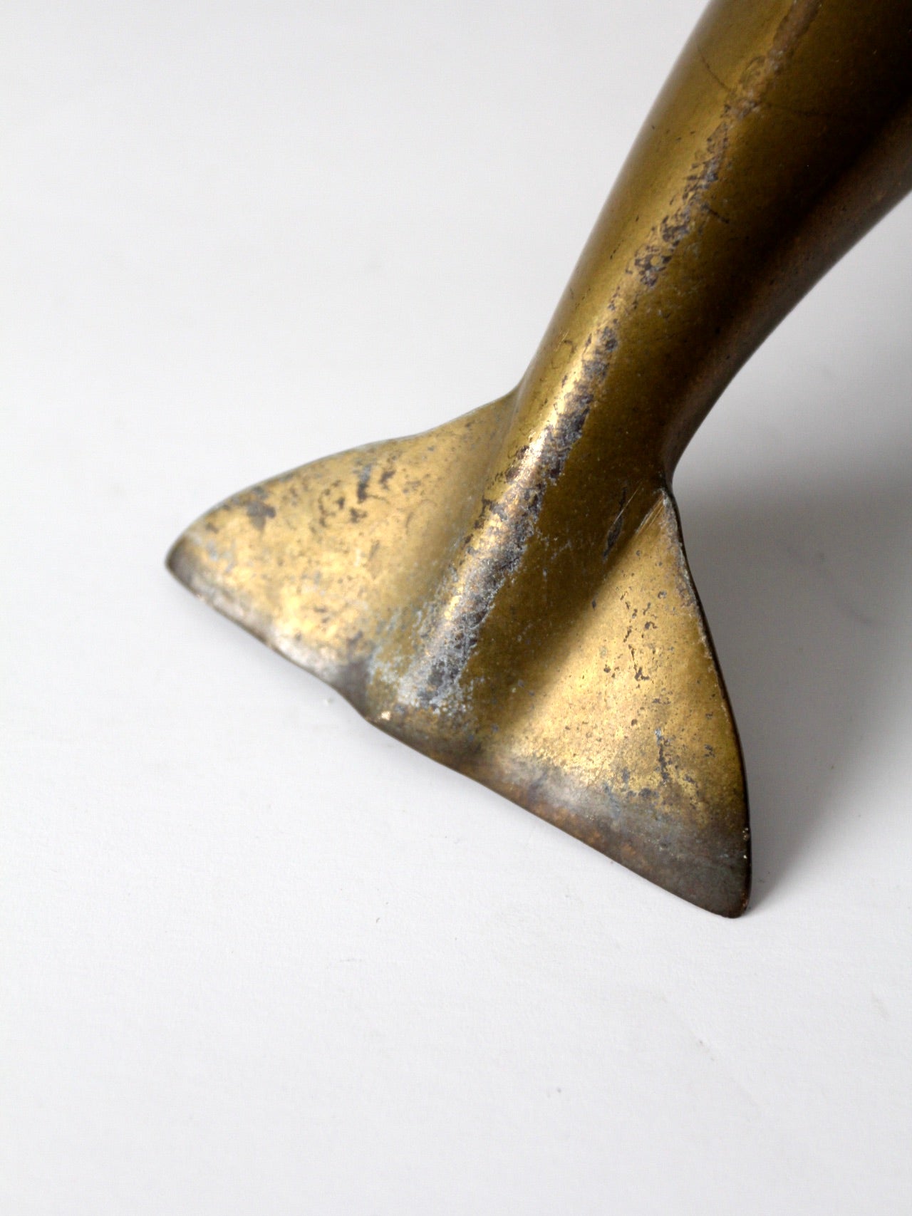 mid-century brass dolphin