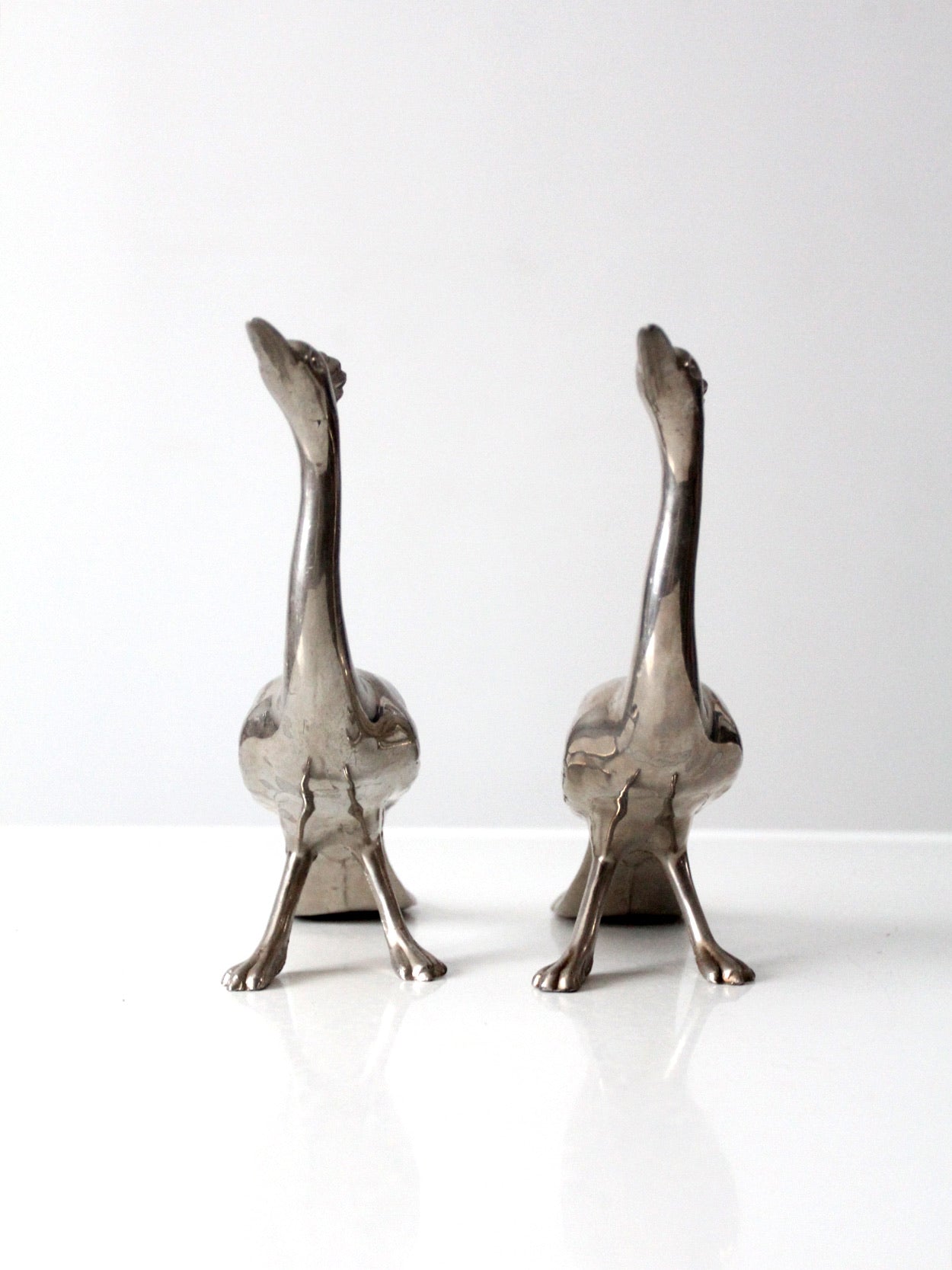 mid-century peacock figurines pair