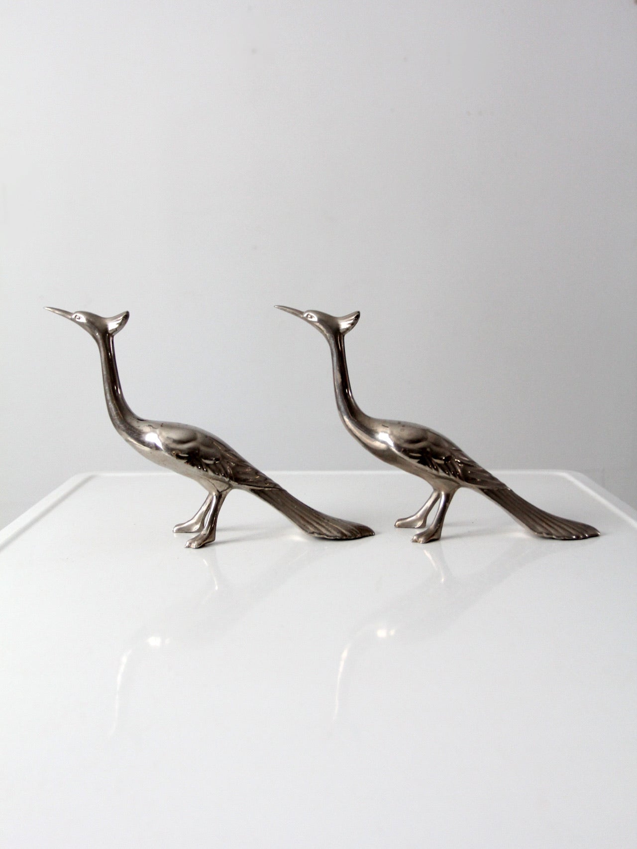 mid-century peacock figurines pair