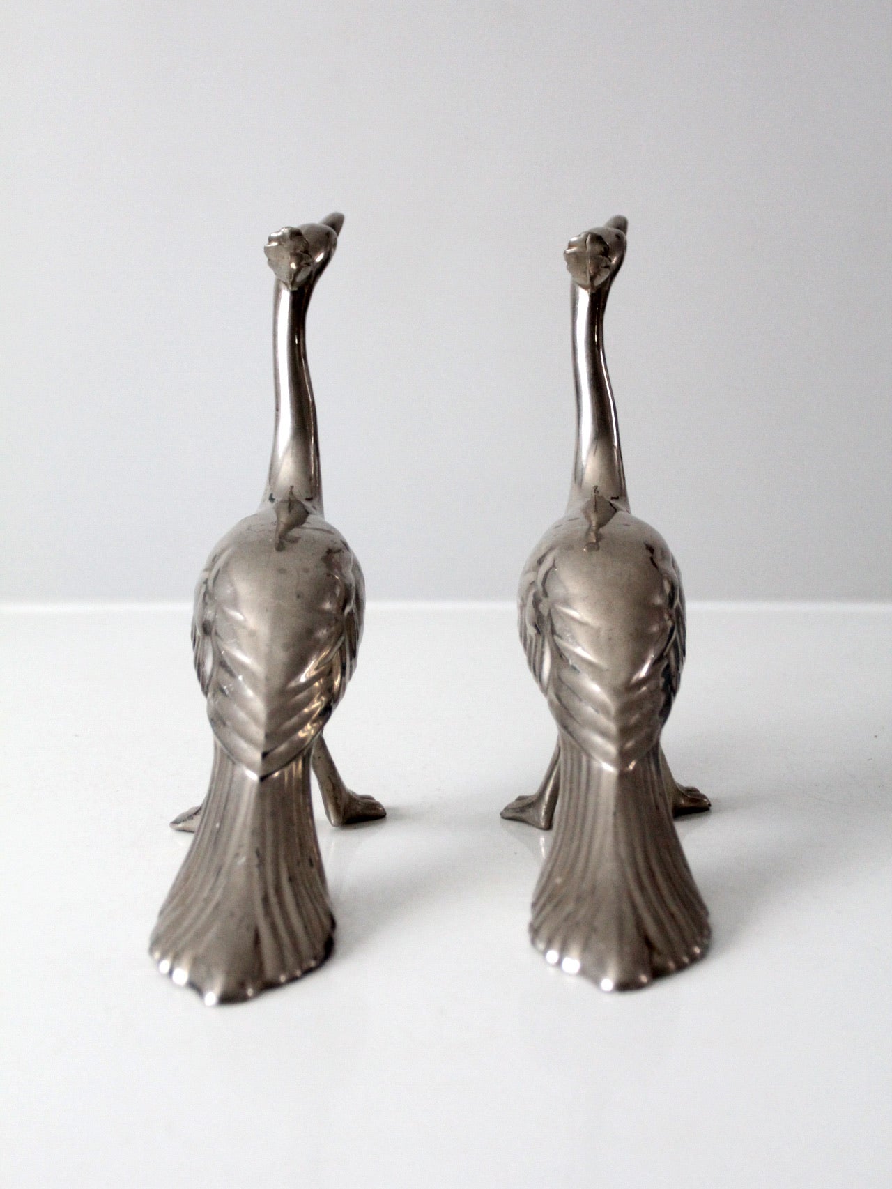 mid-century peacock figurines pair