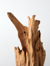 mid-century wood sculpture on stand