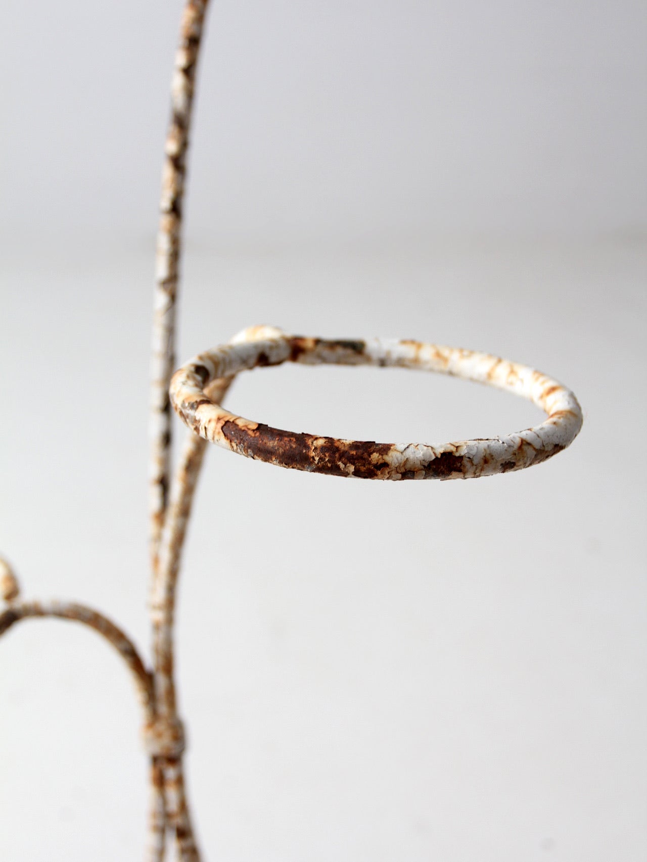 antique white iron plant stand