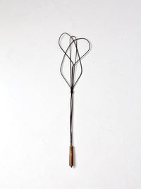 antique rug beater