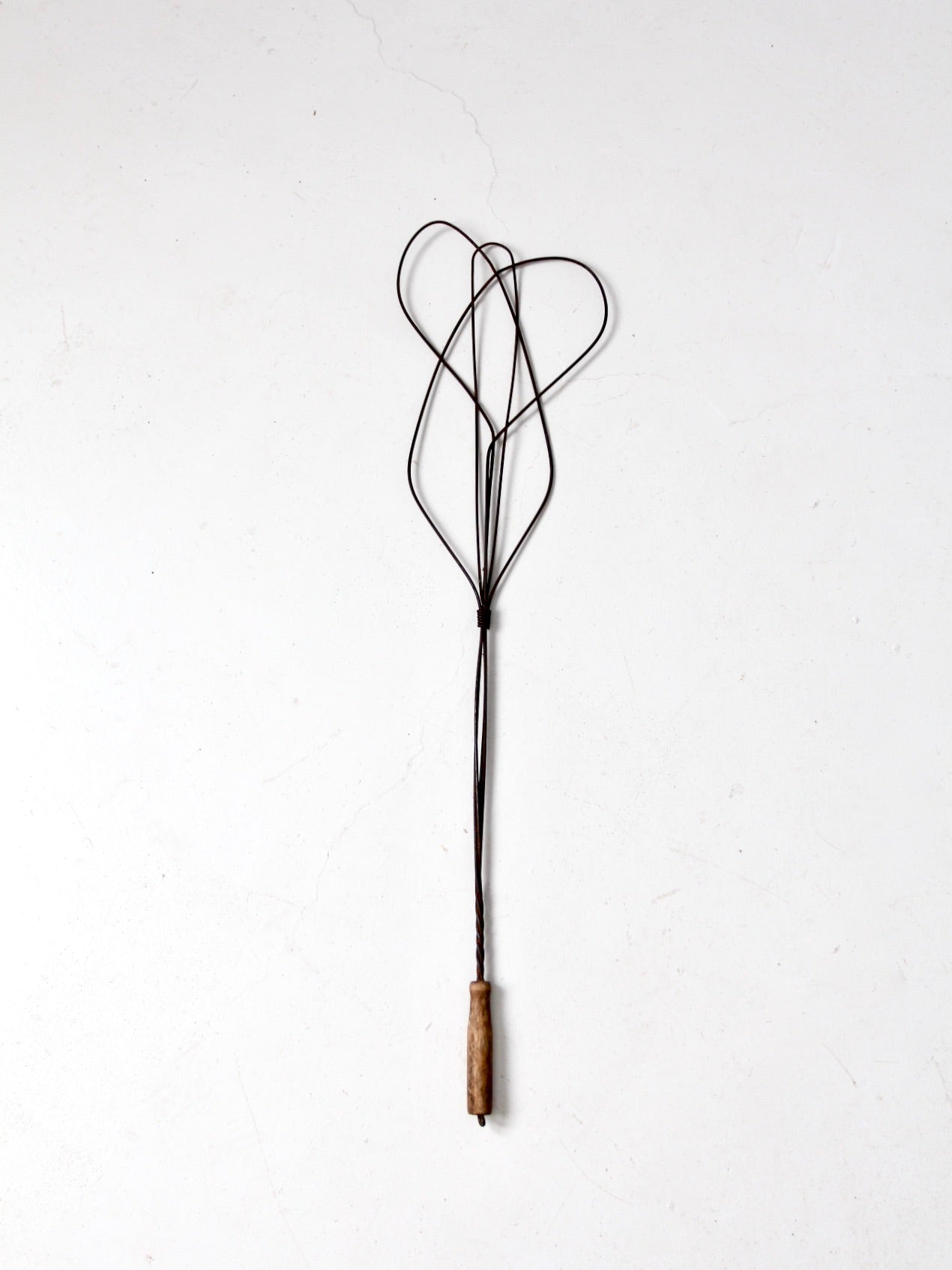 antique rug beater