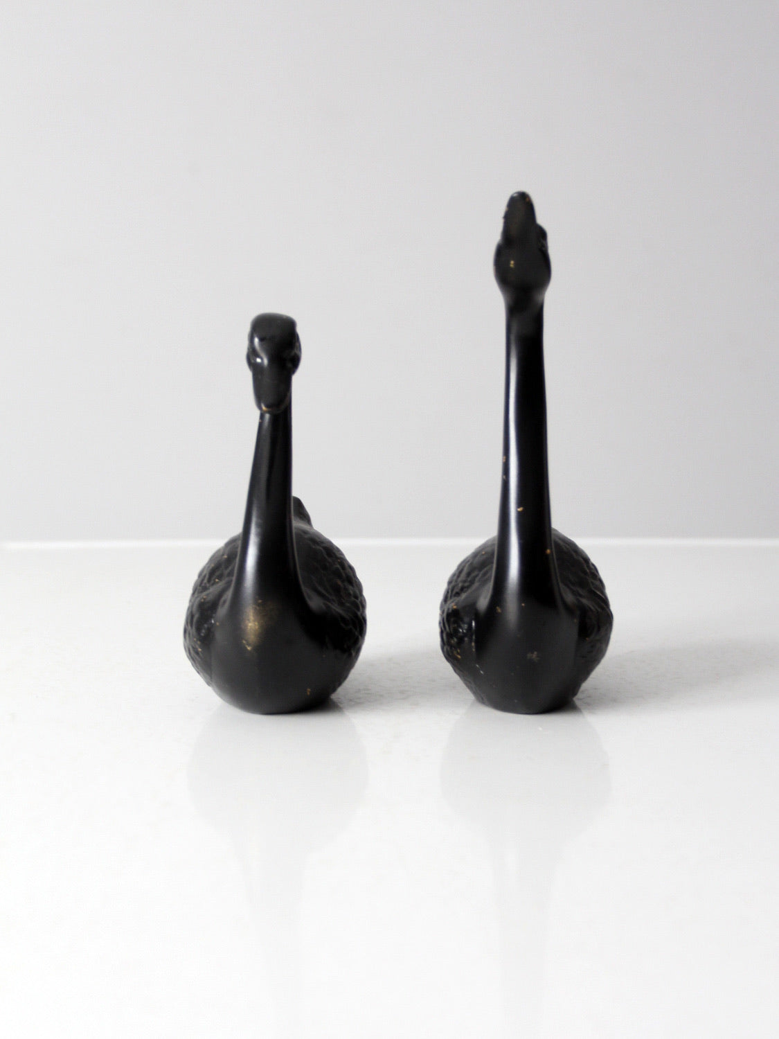 mid century painted black brass swans pair