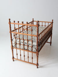 antique Victorian wooden frame bed