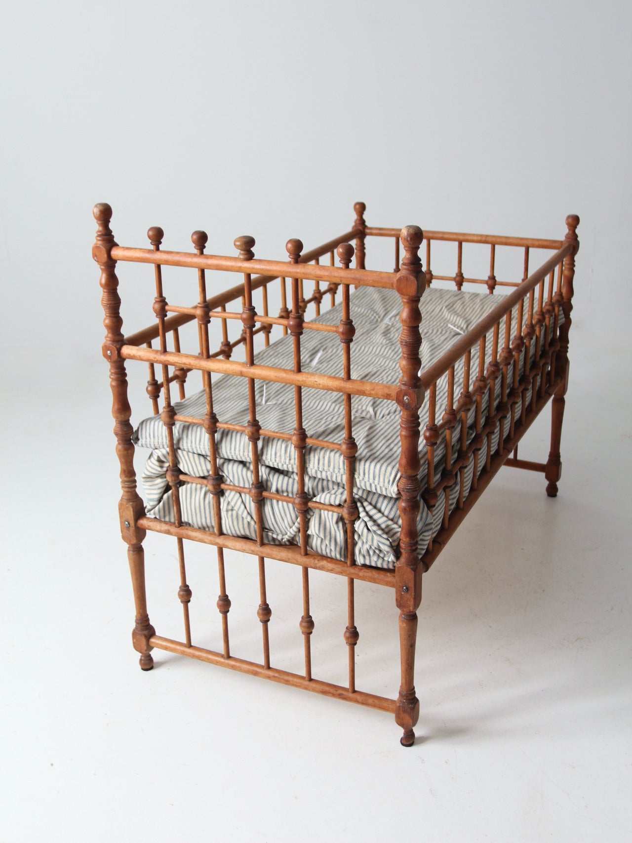 antique Victorian wooden frame bed