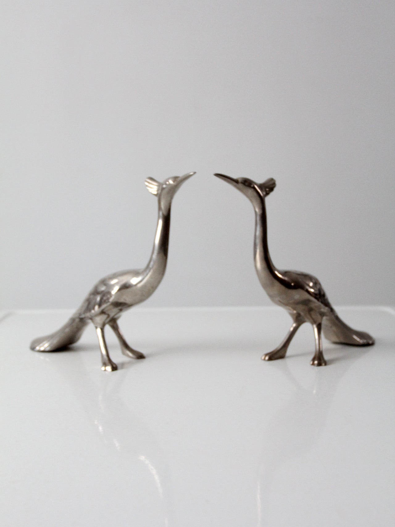 mid-century peacock figurines pair