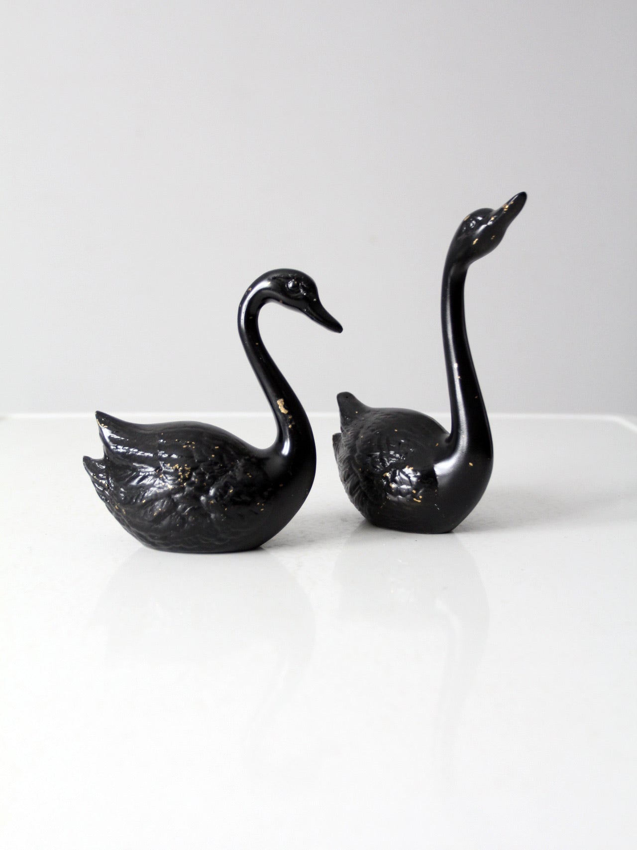 mid century painted black brass swans pair
