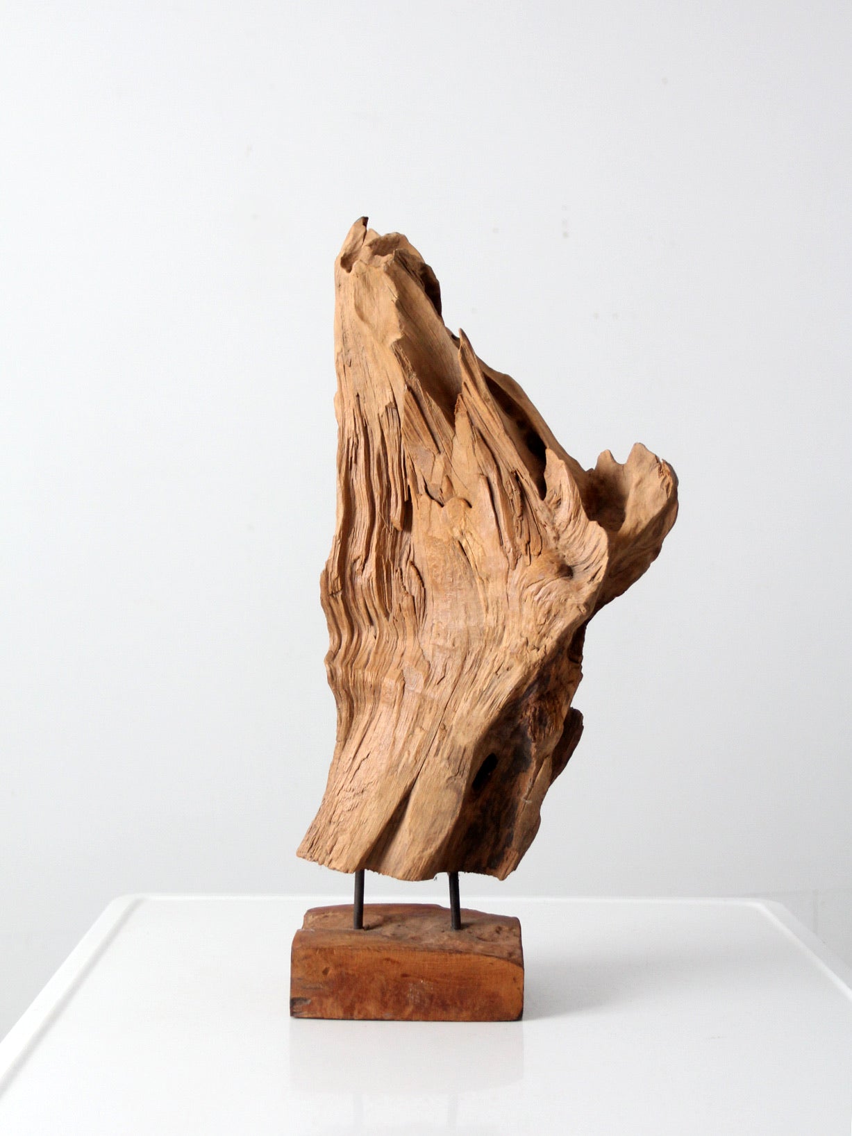 mid-century wood sculpture on stand